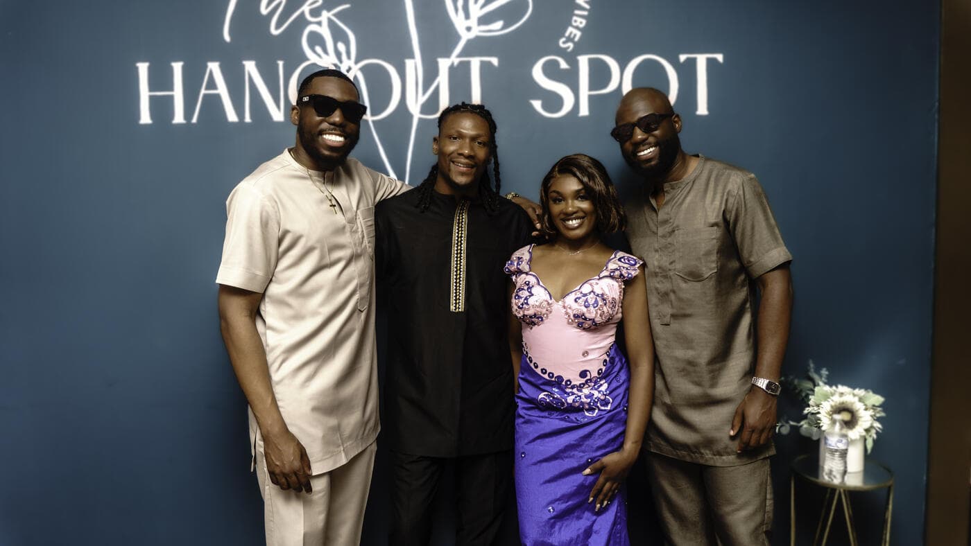 Four guests in traditional attire posing together at Gala Night