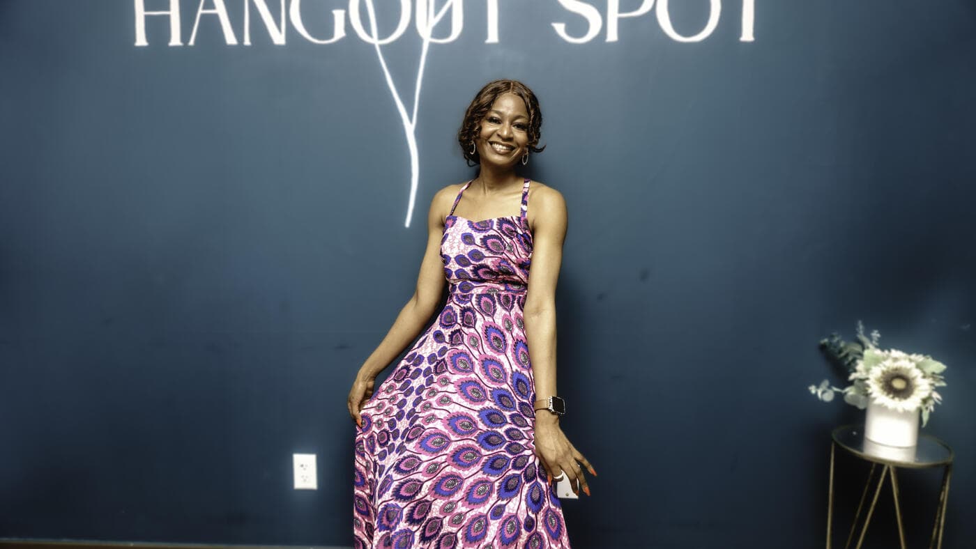 A guest in a purple print dress at Gala Night
