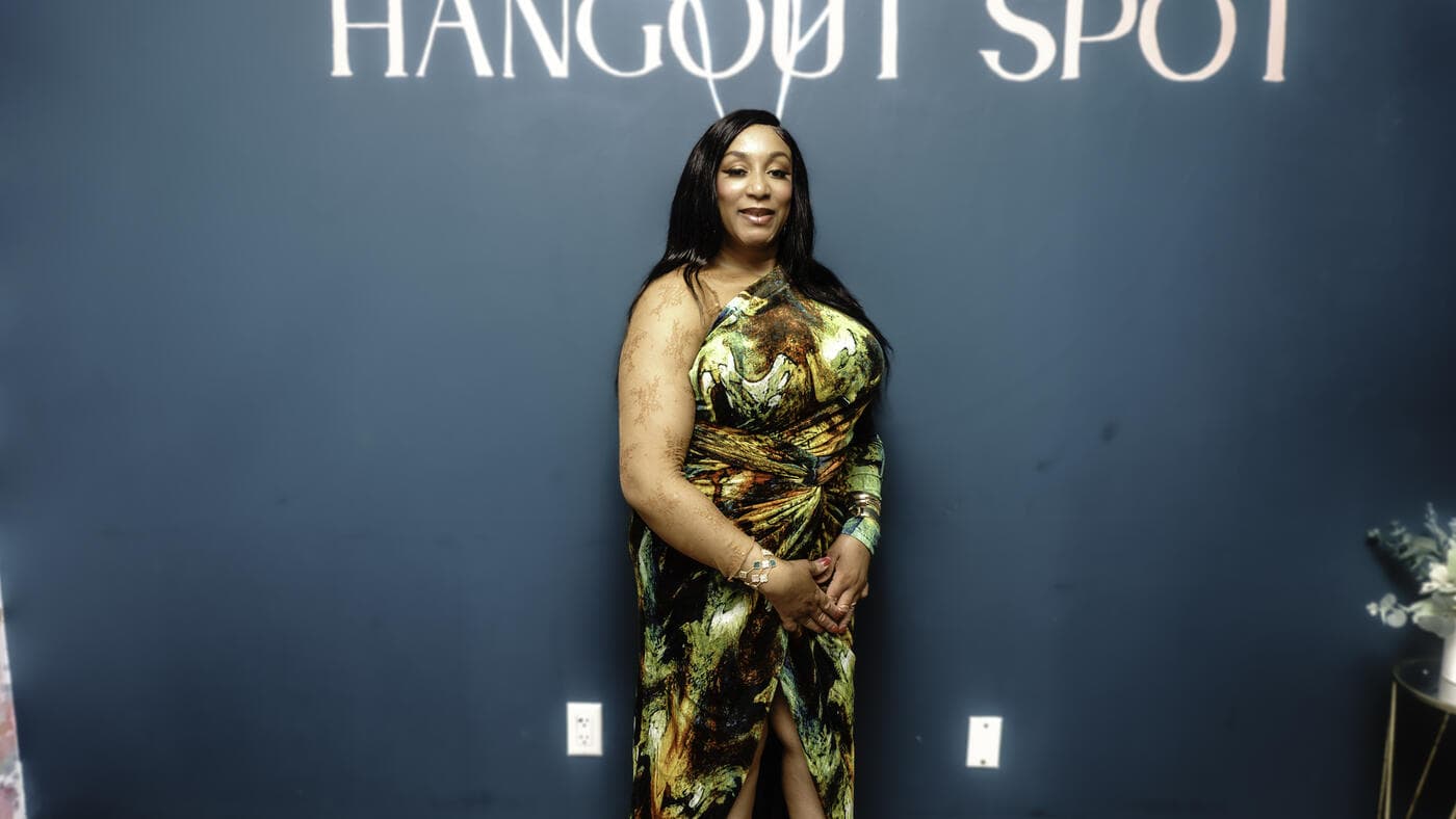A guest in a green print dress at Gala Night