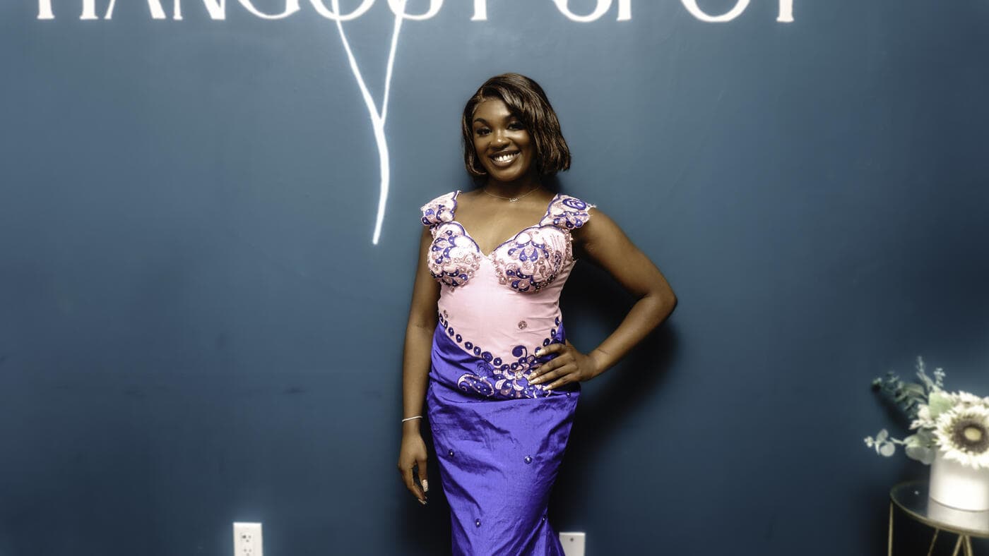 A guest in a pink and purple gown at Gala Night
